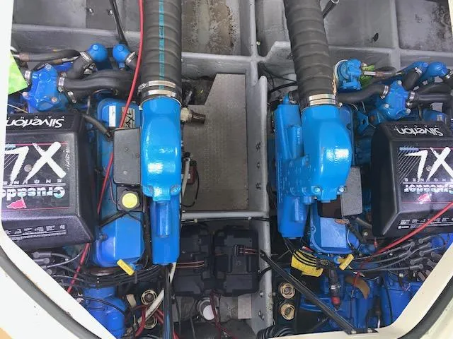 Slide: The Image of 1994 Silverton 34 Express engine compartment with twin Crusader 7XL engines. - 22
