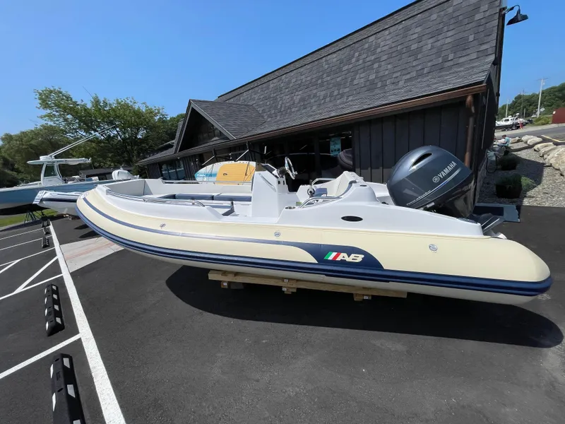 The Image of 2025 AB Inflatables Nautilus 17 DLX boat with Yamaha engine, displayed outdoors. - 13