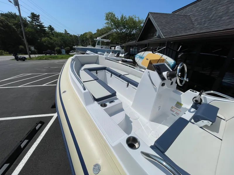 Slide: The Image of 2025 AB Inflatables Nautilus 17 DLX boat with sleek seating and modern design. - 25