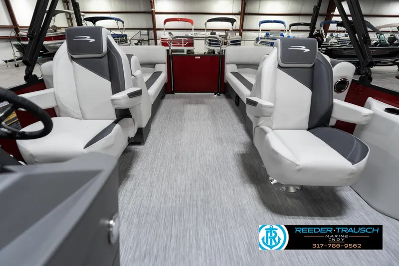 Slide: The Image of 2025 Bennington 22 SSR pontoon boat interior with modern seating and sleek design. - 17