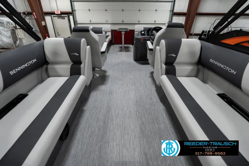 Slide: The Image of 2025 Bennington 22 SSR pontoon boat interior with gray seating and modern design. - 19