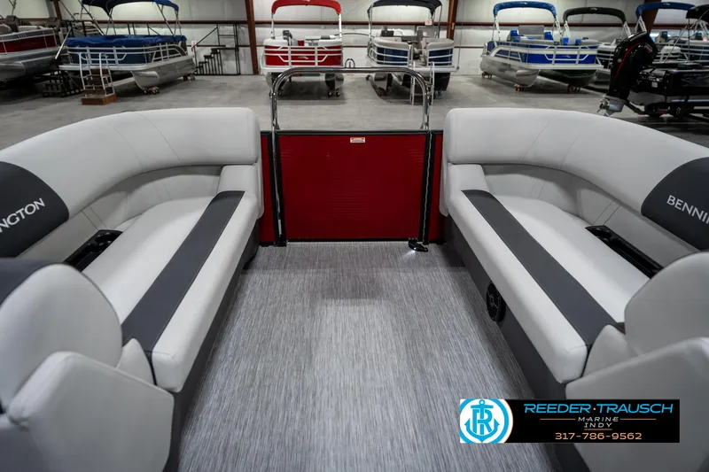 Slide: The Image of 2025 Bennington 22 SSR pontoon boat interior with gray seating and red gate. - 26