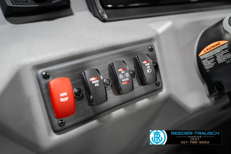 Slide: The Image of Control panel of a 2025 Bennington 22 SSR boat with labeled switches. - 31