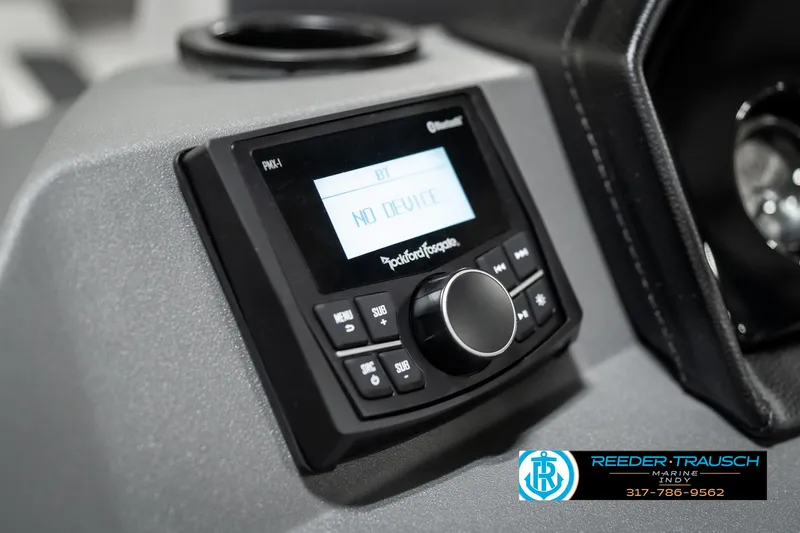Slide: The Image of 2025 Bennington 22 SSR boat dashboard with Rockford Fosgate audio system. - 32
