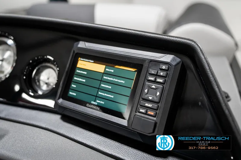 Slide: The Image of Dashboard of 2025 Bennington 22 SSR with Garmin navigation system. - 34