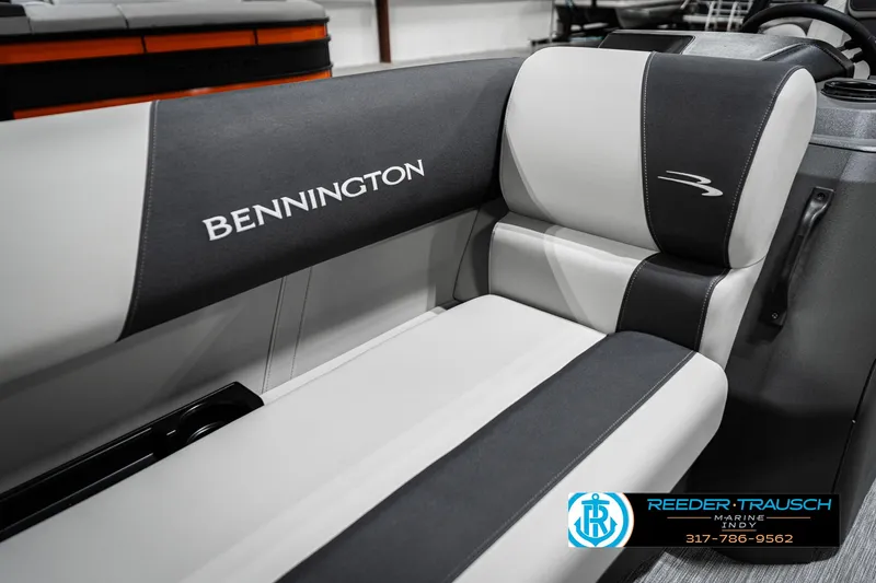 Slide: The Image of 2025 Bennington 22 SSR boat interior with sleek black and gray seating. - 38