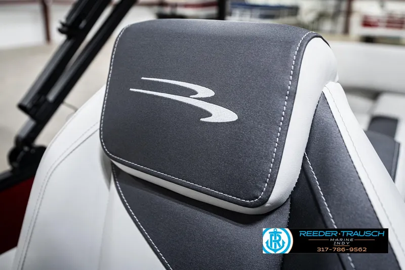 Slide: The Image of 2025 Bennington 22 SSR boat seat with logo, featuring sleek gray and white design. - 40