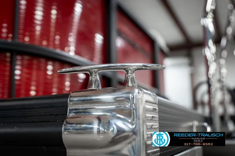 Slide: The Image of 2025 Bennington 22 SSR boat cleat detail in showroom setting. - 49