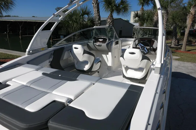 Slide: The Image of 2025 Chaparral 21 SSi Outboard boat interior with sleek seating and modern design. - 10