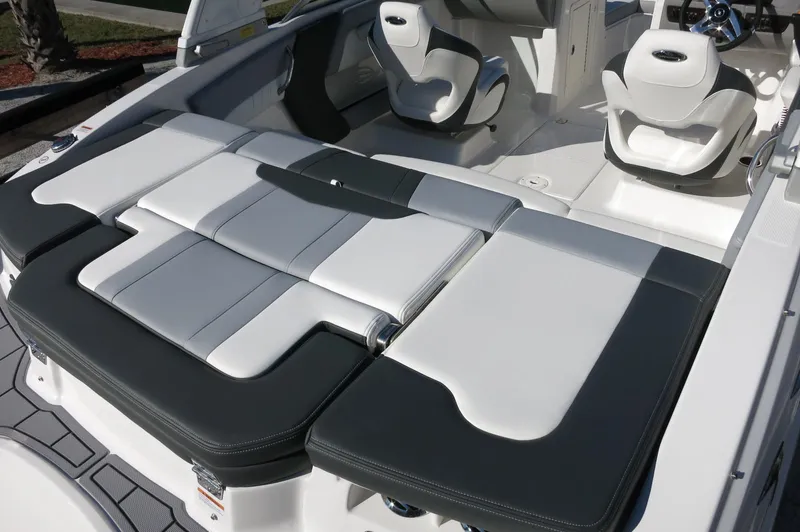 Slide: The Image of 2025 Chaparral 21 SSi Outboard boat interior with sleek seating and modern design. - 11