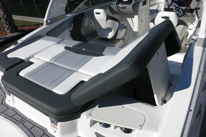 Slide: The Image of 2025 Chaparral 21 SSi Outboard boat interior with sleek seating and modern design. - 14