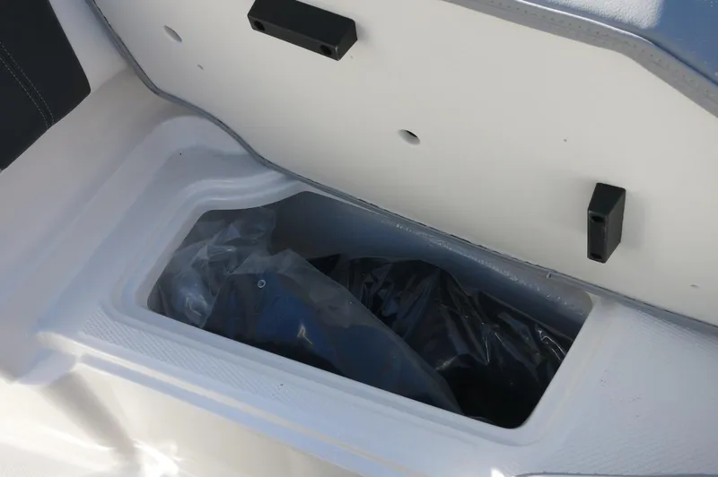 Slide: The Image of Storage compartment in 2025 Chaparral 21 SSi Outboard boat. - 33