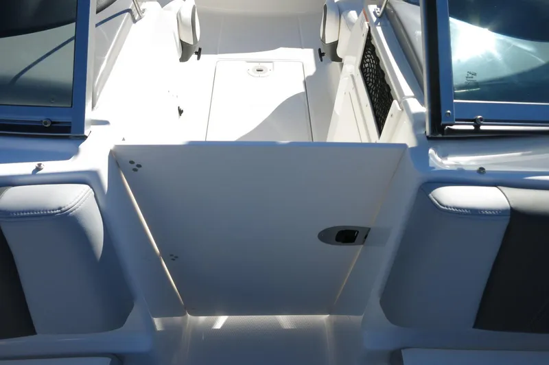 Slide: The Image of 2025 Chaparral 21 SSi Outboard boat interior, featuring sleek seating and modern design elements. - 39