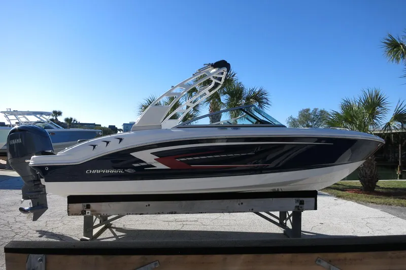 Slide: The Image of 2025 Chaparral 21 SSi Outboard boat on display, featuring sleek design and modern aesthetics. - 8