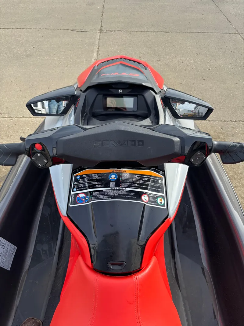 Slide: The Image of 2023 Sea-Doo GTI SE 170 dashboard with red seat and control panel. - 6