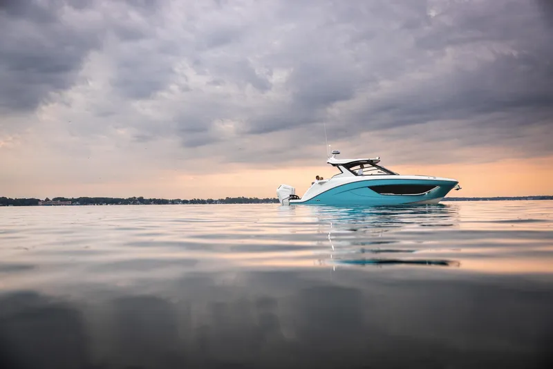 Slide: The Image of 2026 Hurricane SunDeck 3200 OB interior with modern seating and sleek design. - 15