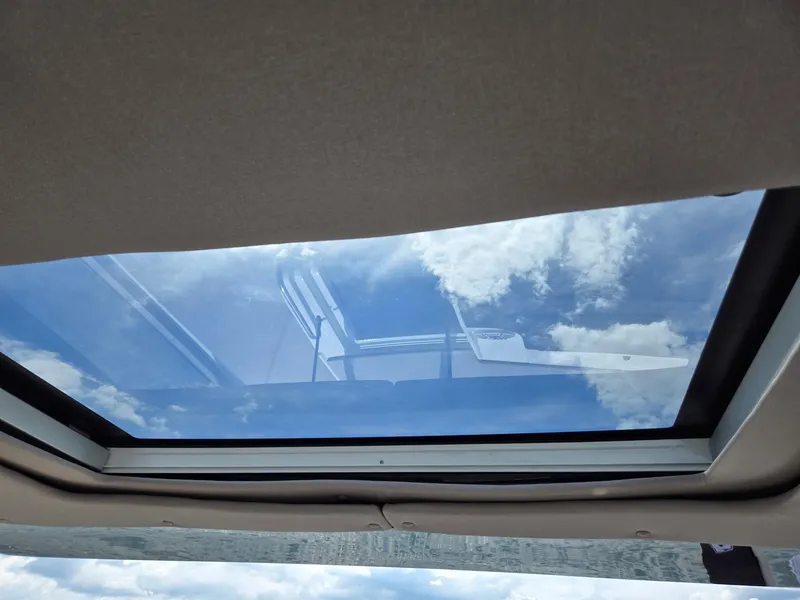 Slide: The Image of Control panel of 2026 Hurricane SunDeck 3200 OB boat with Optimus EPS system. - 22