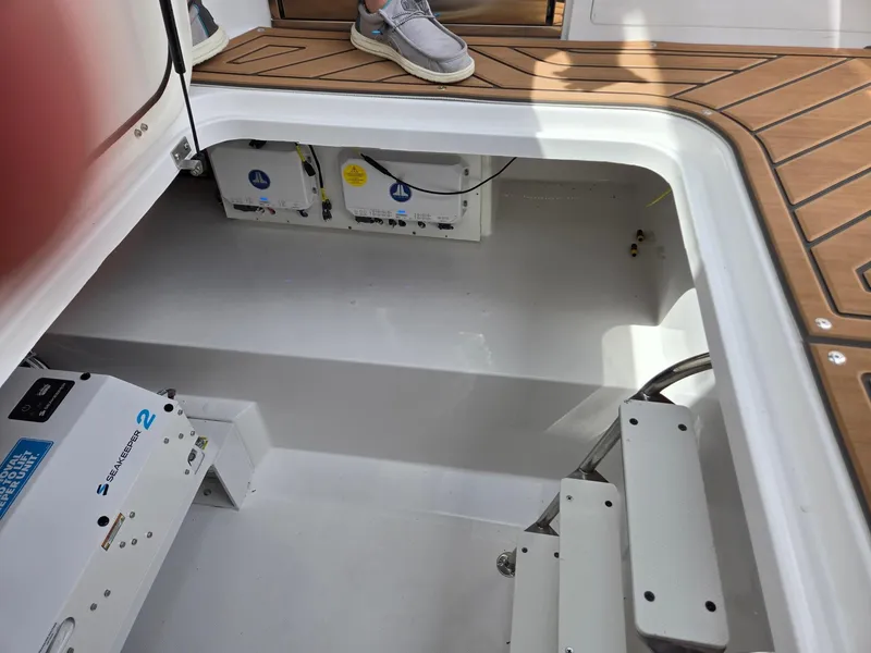 Slide: The Image of Control panel of 2026 Hurricane SunDeck 3200 OB with joystick and keys. - 26