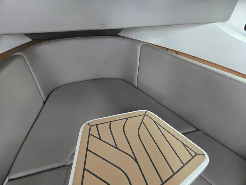 Slide: The Image of 2026 Hurricane SunDeck 3200 OB boat dashboard with Simrad device and JL Audio speaker. - 27