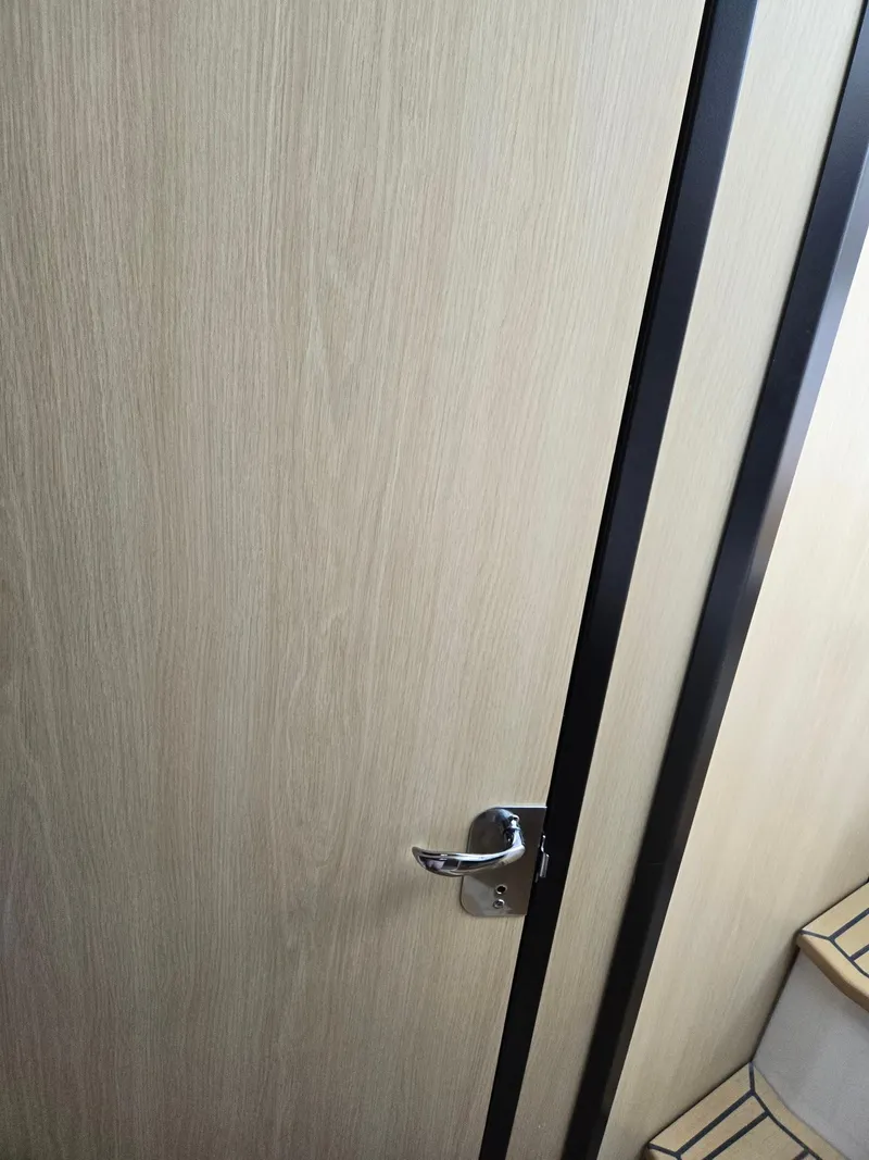 Slide: The Image of 2026 Hurricane SunDeck 3200 OB boat interior with dual captain's seats and control panel. - 32