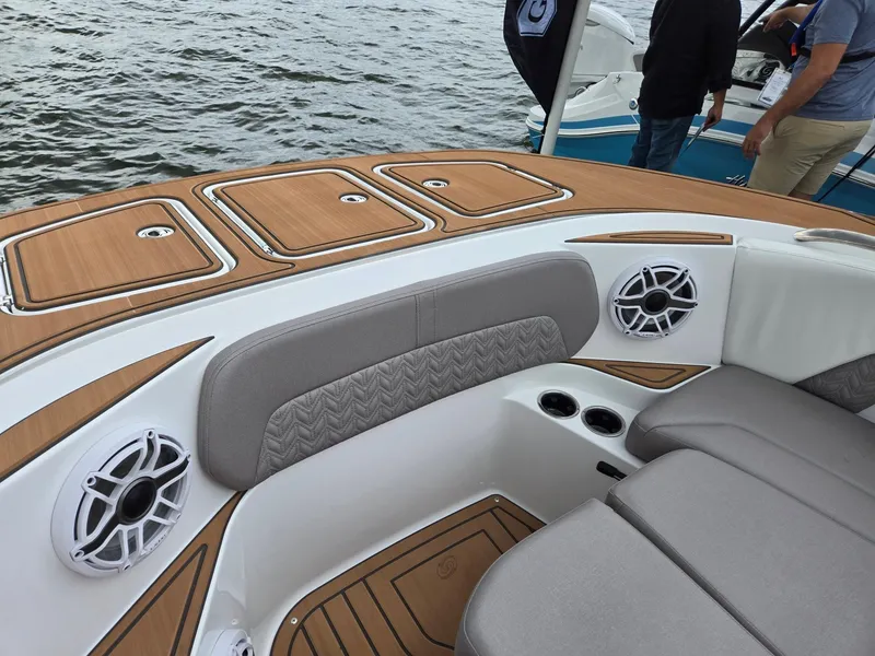 Slide: The Image of 2026 Hurricane SunDeck 3200 OB boat interior with stylish seating and table. - 41