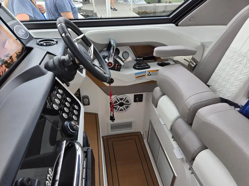 Slide: The Image of 2026 Hurricane SunDeck 3200 OB boat sunroof with clear blue sky view. - 46