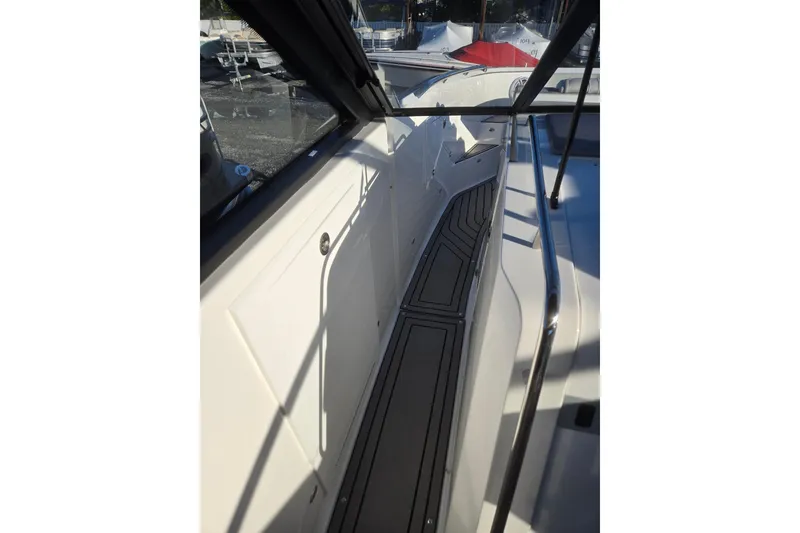 Slide: The Image of 2026 Hurricane SunDeck 3200 OB boat interior with sleek design and modern features. - 65