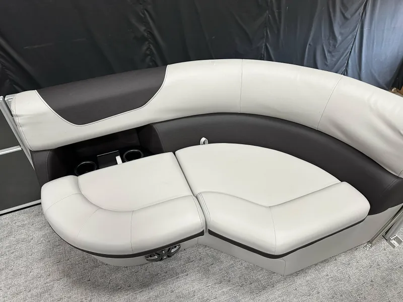 Slide: The Image of Luxurious seating on 2025 South Bay 222FCR LE boat, featuring sleek design and cup holders. - 10