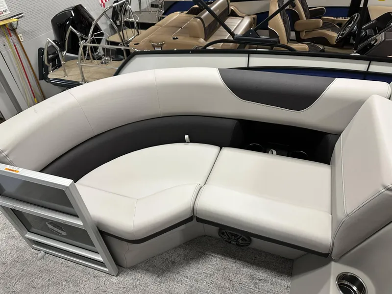 Slide: The Image of 2025 South Bay 222FCR LE pontoon boat interior with plush seating and modern design. - 11
