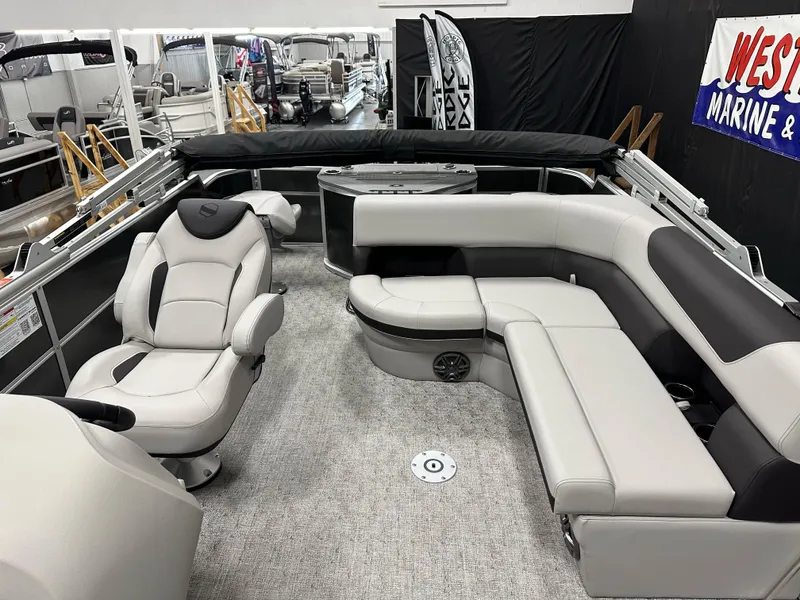 Slide: The Image of 2025 South Bay 222FCR LE pontoon boat interior with plush seating and modern design. - 13