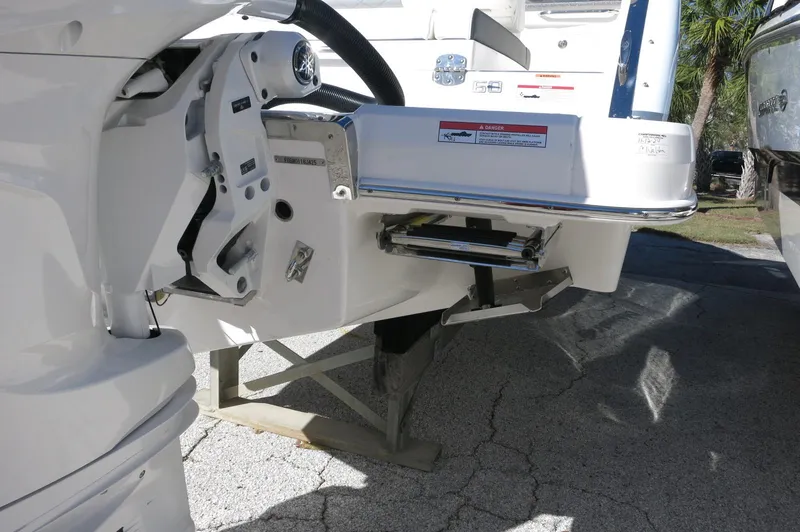 Slide: The Image of 2025 Chaparral 280 OSX Bowrider boat engine detail, showcasing sleek design and modern features. - 12