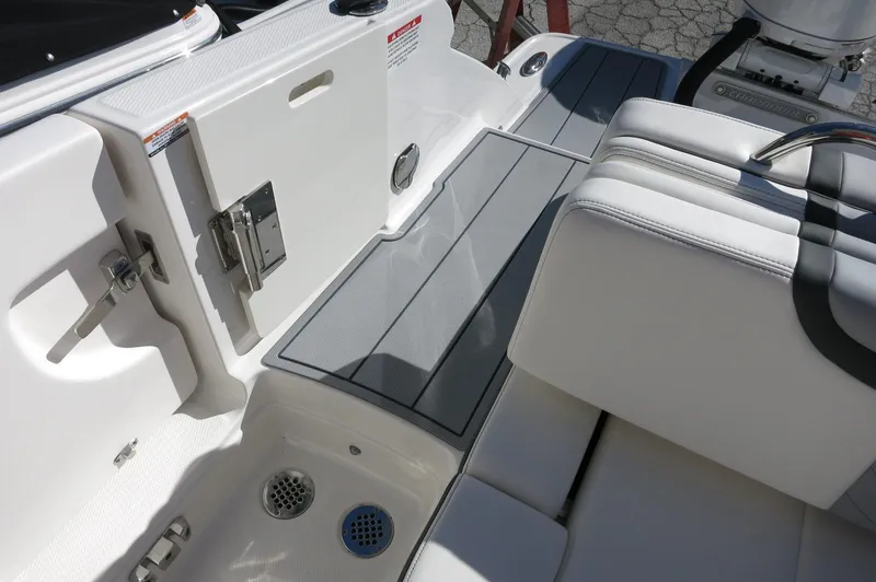 Slide: The Image of 2025 Chaparral 280 OSX Bowrider interior, featuring sleek seating and modern design elements. - 18