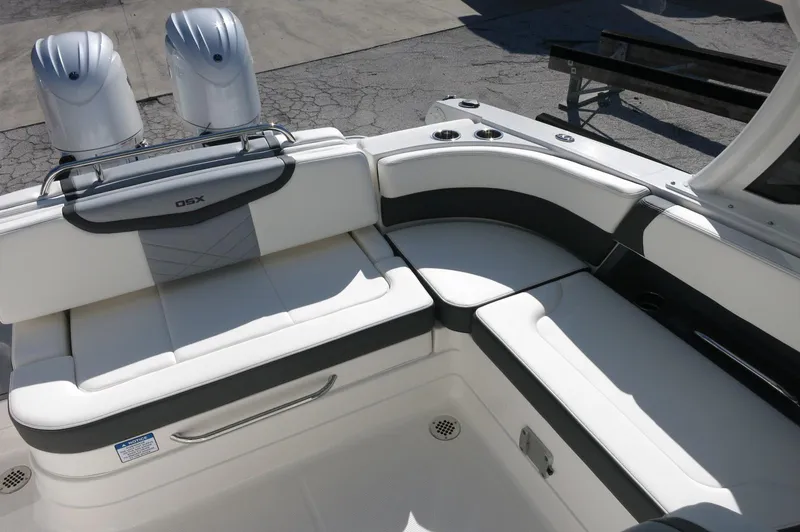 Slide: The Image of 2025 Chaparral 280 OSX Bowrider, featuring spacious seating and dual outboard engines. - 25