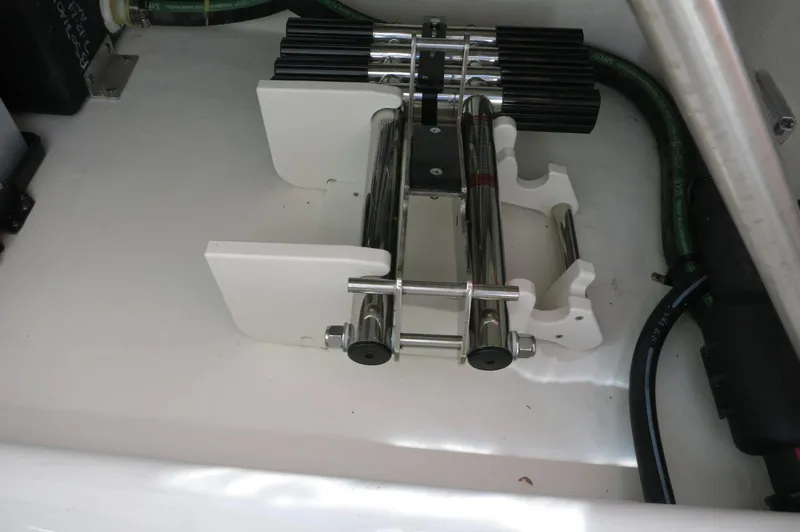 Slide: The Image of 2025 Chaparral 280 OSX Bowrider engine compartment with stainless steel components. - 30