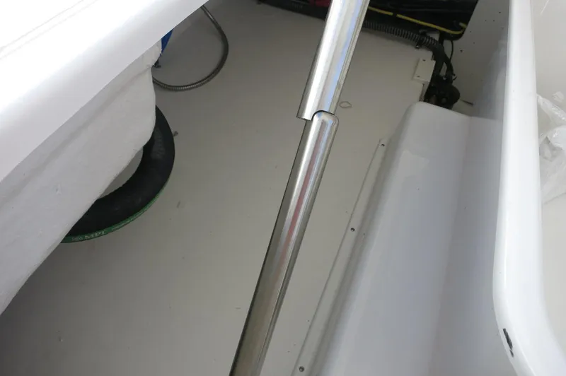 Slide: The Image of Interior view of 2025 Chaparral 280 OSX Bowrider boat, featuring sleek metal railing. - 31