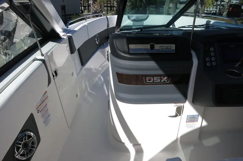 Slide: The Image of 2025 Chaparral 280 OSX Bowrider interior, featuring sleek design and modern controls. - 39
