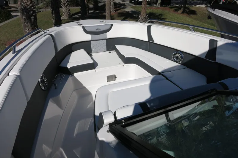 Slide: The Image of 2025 Chaparral 280 OSX Bowrider interior with spacious seating and modern design. - 43
