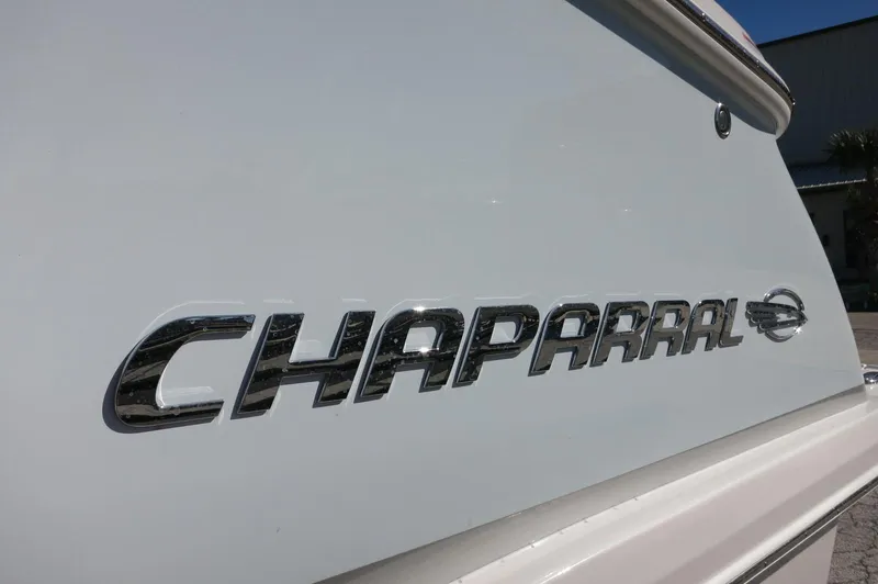 Slide: The Image of 2025 Chaparral 280 OSX Bowrider logo on boat exterior. - 6
