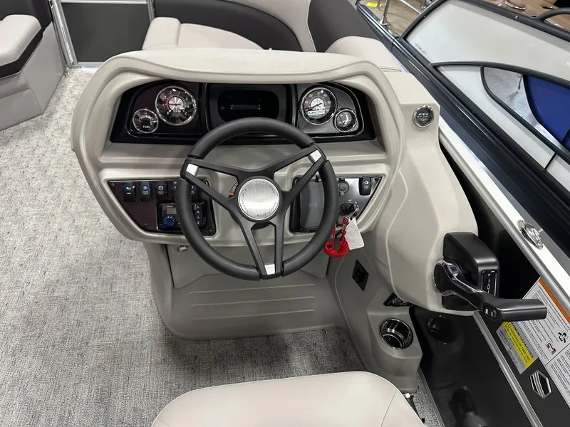 Slide: The Image of 2025 South Bay 222FCR LE 2.75 boat interior with plush seating and cup holders. - 11