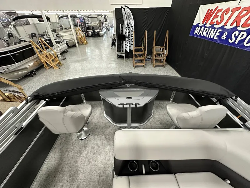 Slide: The Image of 2025 South Bay 222FCR LE 2.75 pontoon boat interior with plush seating and modern design. - 16