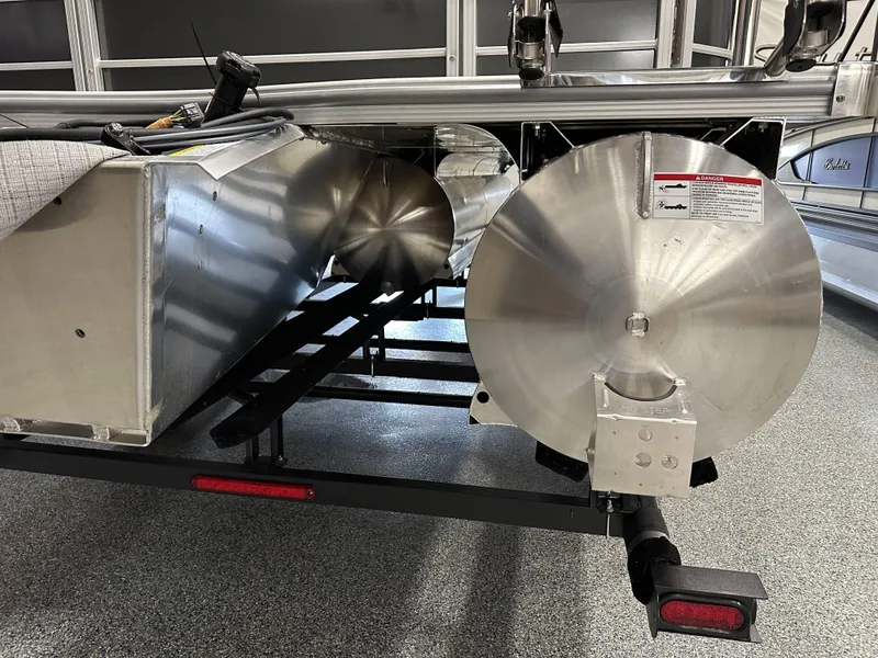 Slide: The Image of Close-up of South Bay 222FCR LE 2.75 boat component with caution label, 2025 model. - 19