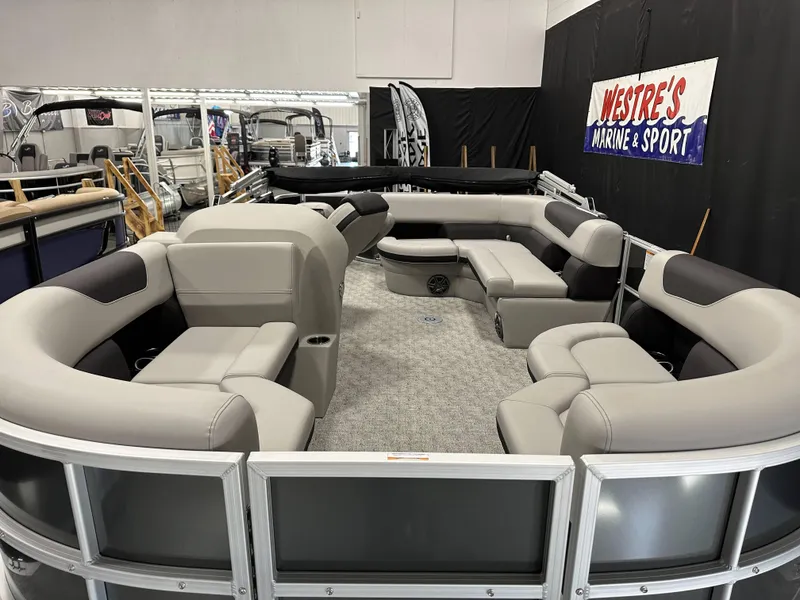 Slide: The Image of 2025 South Bay 222FCR LE 2.75 pontoon boat interior with plush seating and modern design. - 6