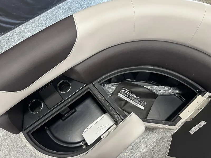 Slide: The Image of Luxurious seating on 2025 South Bay 222FCR LE 2.75 pontoon boat, featuring cup holders. - 8