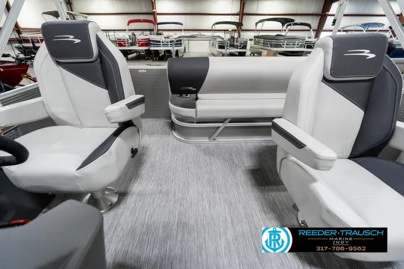 Slide: The Image of 2025 Bennington 22 SSB boat interior with modern seating and sleek design. - 17