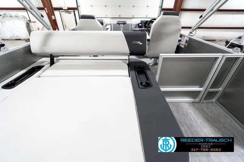 Slide: The Image of 2025 Bennington 22 SSB boat interior with seating and storage compartments. - 19