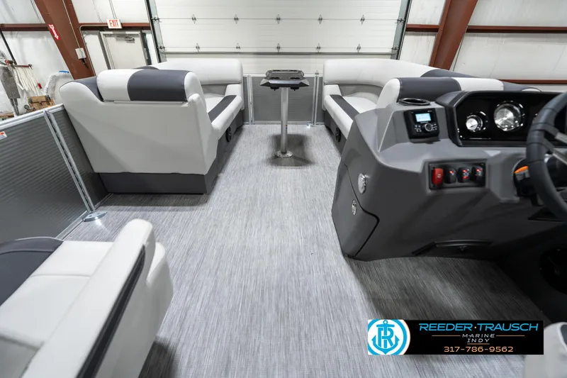 Slide: The Image of 2025 Bennington 22 SSB pontoon boat interior with modern seating and control panel. - 20