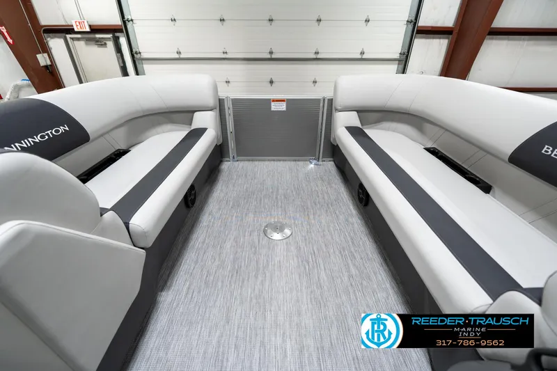 Slide: The Image of 2025 Bennington 22 SSB boat interior with gray seating and flooring. - 22