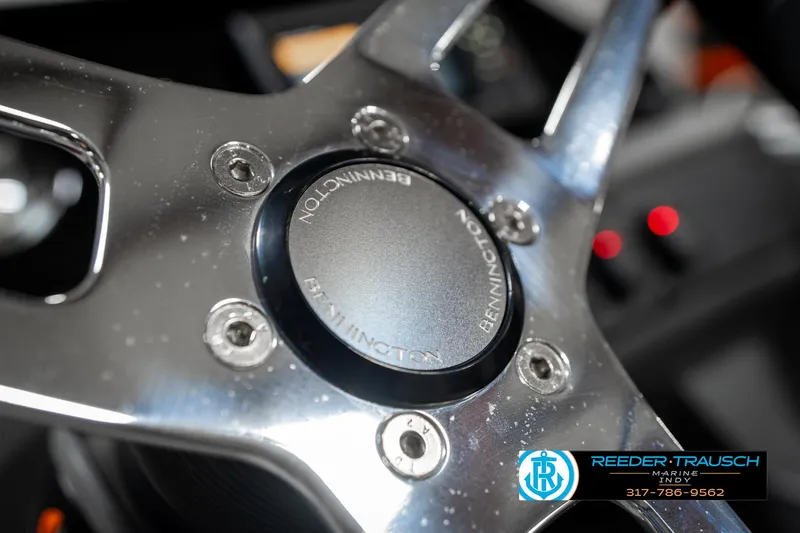 Slide: The Image of Steering wheel of 2025 Bennington 22 SSB boat, close-up view. - 32