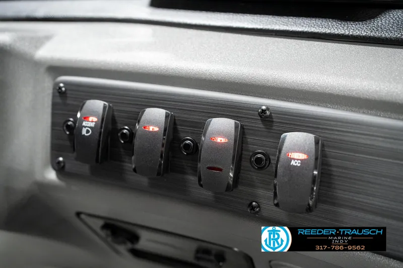 Slide: The Image of Control panel of 2025 Bennington 22 SSB boat with labeled switches. - 37