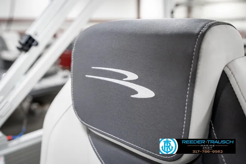 Slide: The Image of 2025 Bennington 22 SSB boat seat with logo, featuring sleek gray and white design. - 42